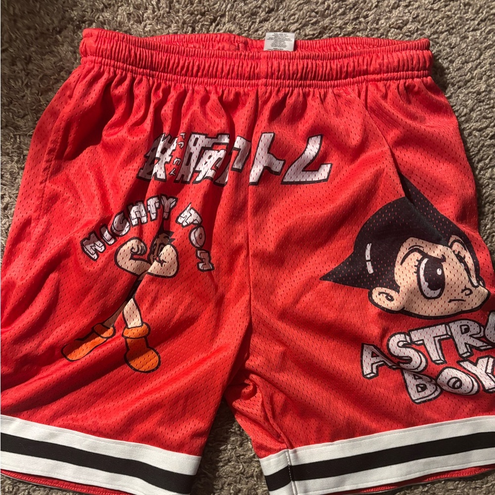 Red Athletic Mesh Shorts with Vintage Cartoon Design